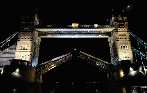 Image white and brown concrete bridge during night time