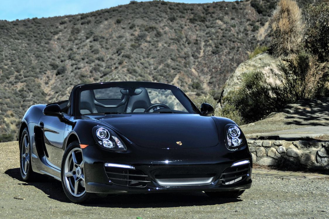 Black Porsche 911 on Brown Dirt Road During Daytime. Wallpaper in 3749x2499 Resolution