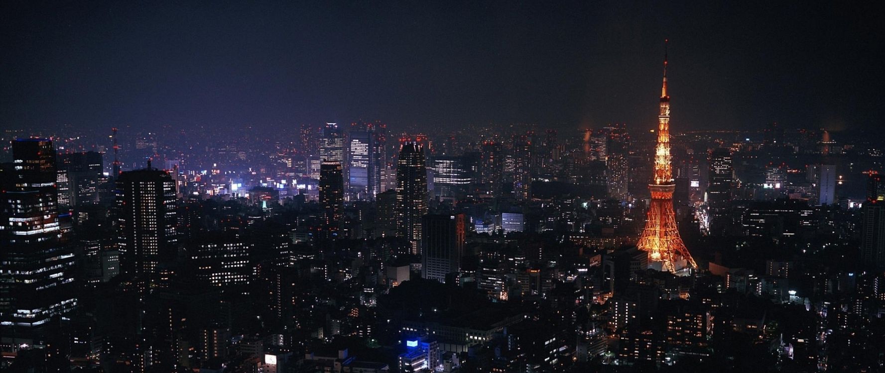 city skyline during night time