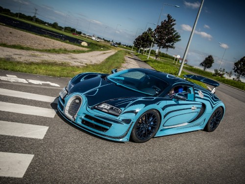 Image blue ferrari 458 italia on road during daytime