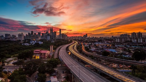 Image city with high rise buildings during sunset