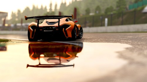 Image black and orange sports car scale model