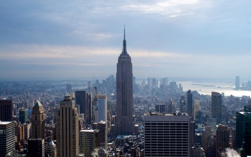 Image city skyline under blue sky during daytime