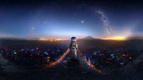 Image man in black jacket and gray knit cap standing on top of mountain looking at the with with with with