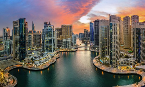 Image city skyline with high rise buildings during sunset