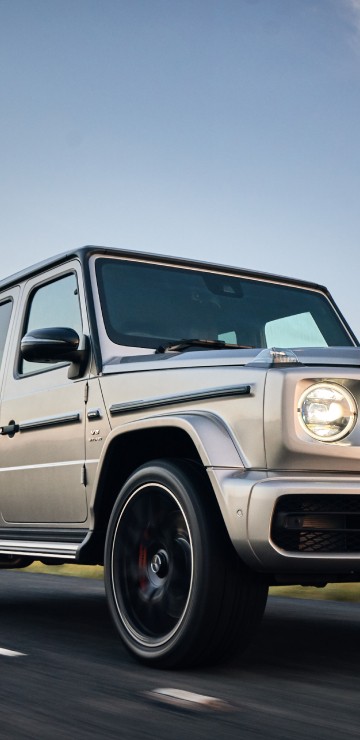 Image white mercedes benz g class on road during daytime