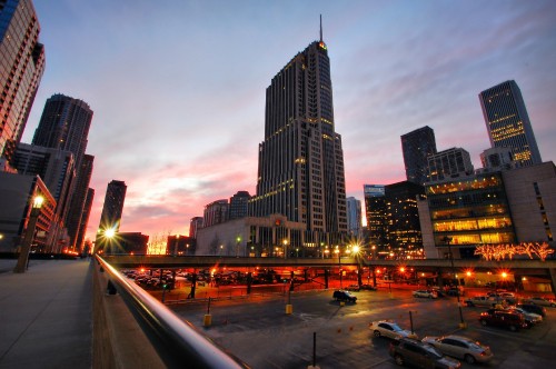 Image city buildings under gray sky during night time