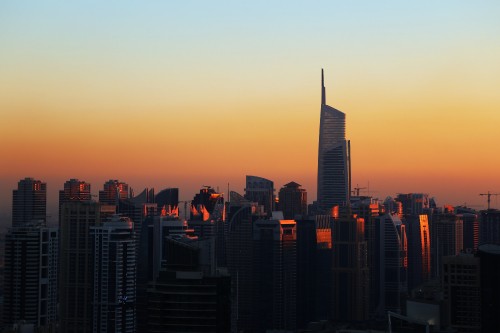 Image high rise buildings during sunset