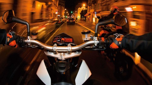 Image black and silver motorcycle on road during night time