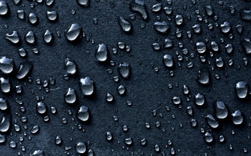 Image water droplets on black surface