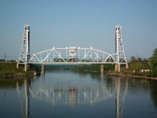 Image gray metal bridge over river