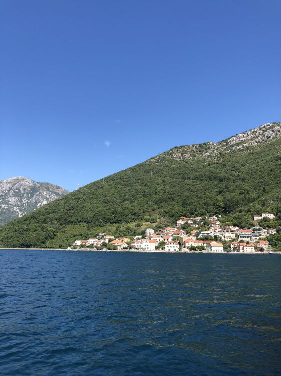 body of water, mountainous landforms, nature, coast, vegetation