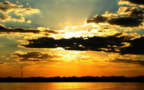 Image body of water during sunset