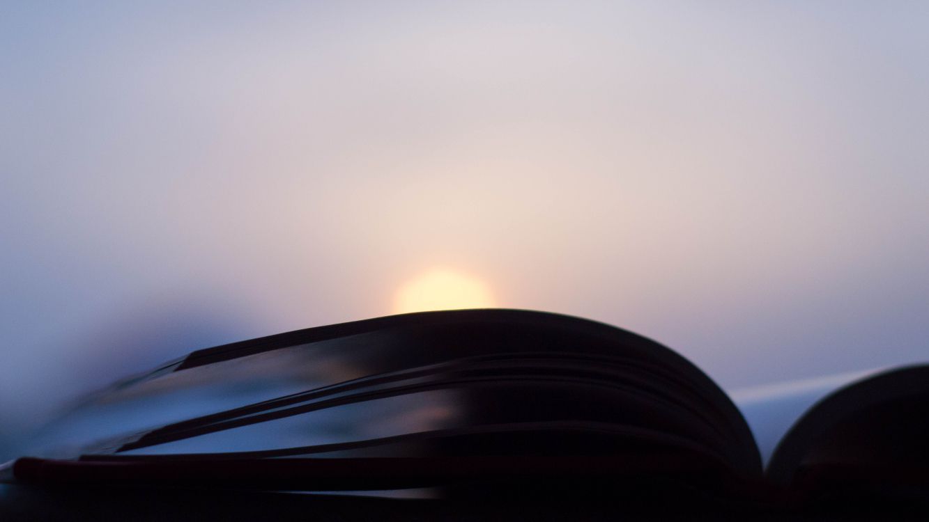 black car on road during sunset