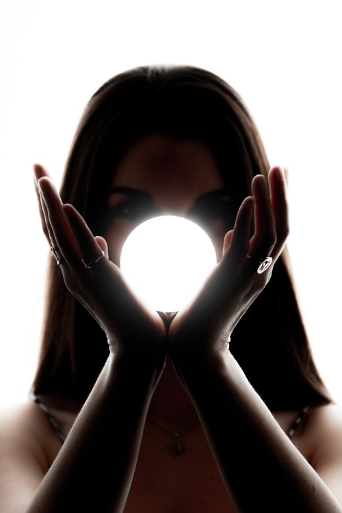 Image woman covering her face with her hands