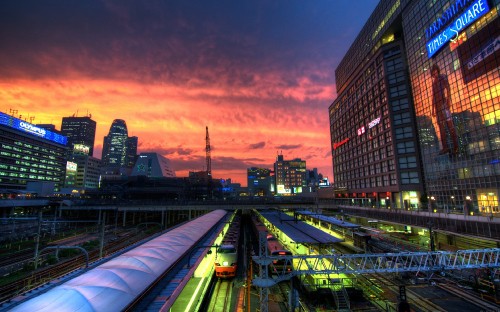 Image time lapse photography of city buildings during night time