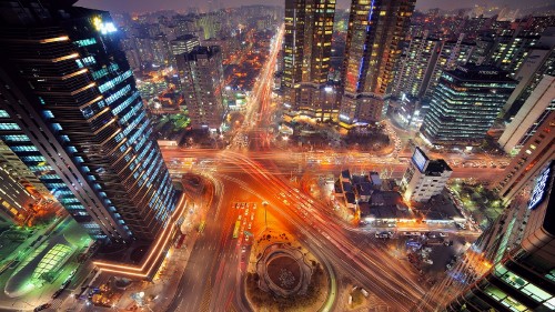 Image aerial view of city buildings during night time