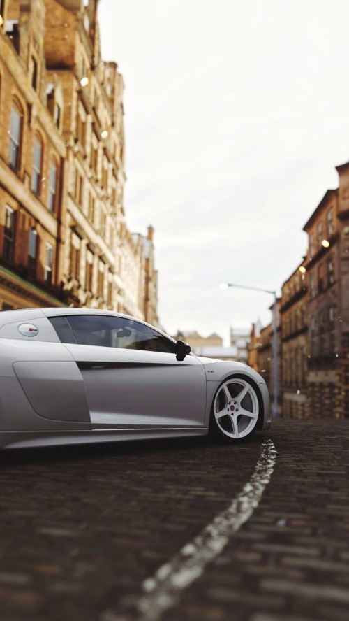 Image silver porsche 911 parked on street during daytime