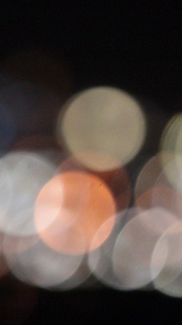 Image white and orange bokeh lights